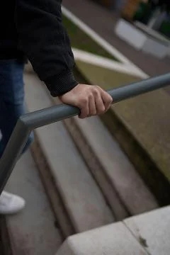 Man walking up stairs Photos