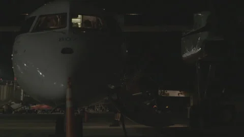 Man Walking Up Stairs into Plane Stock-Footage 154004089