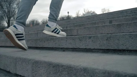 Man walking on steirs,sport,stepping up Stock Footage 106626286