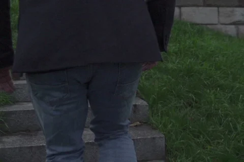 Man walking on steps, steadycam shot, slow motion shot Stock-Footage 45498844