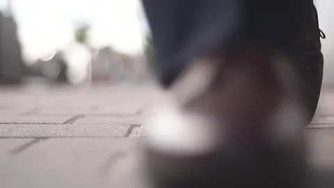 A Man Walking in the Street Stock Footage 72905135