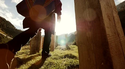 Man walking into the sun. slow motion. recreational. colorful nature Stock Footage 42950424
