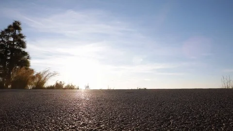 Man walking at sunrise Stock Footage 104123631