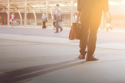 Man walking at sunset. Stock Photos