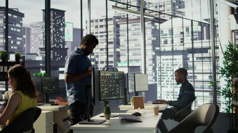 Man walking with tablet in office, fixing coding issues Stock Footage 318163477