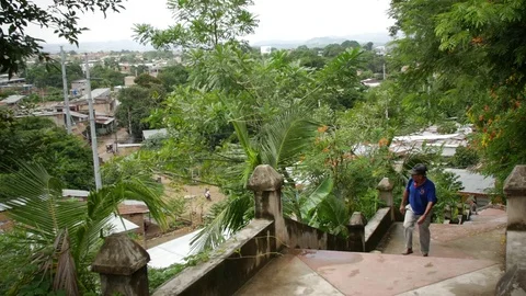 Man Walking in Tarapoto, Peru Video stock 80438064