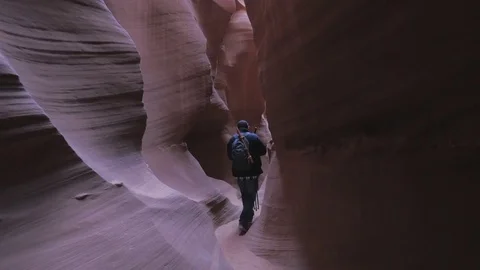 Man Walking Through Antelope Canyon 1 스톡 동영상 78207225