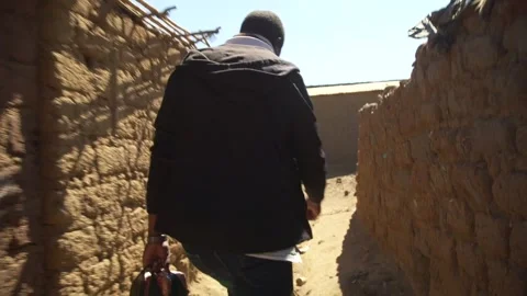 A Man Walking Through Camp Video stock 303794511