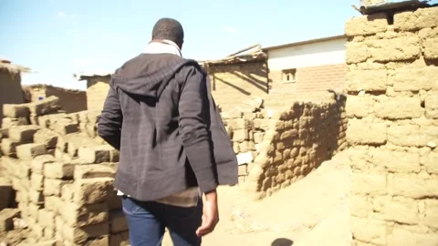 A Man Walking Through Camp Stock Footage 303794516