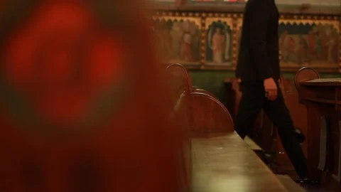 Man walking through church Stock Footage 87201401