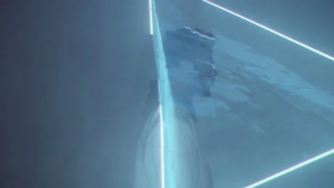 Man Walking through Laser Projection in Dark Room Stock Footage 156520054