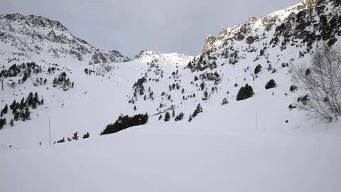 Man walking through the snow Stock Footage 102851724