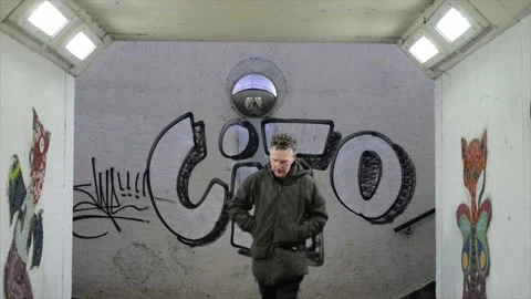 Man walking through underpass tunnel at night leeds uk Stock Footage 171481178