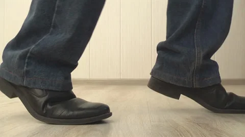 Man walking on tiptoe Stock Footage 39719543