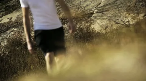 Man Walking Toward Camera, Color Corrected Stock-Footage 12531188