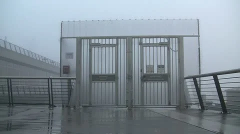 Man Walking Toward SeaplaneTerminal Gate. Stock Footage 19201857