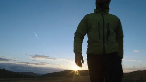 Man Walking towards the Mountain Stock Footage 75206932