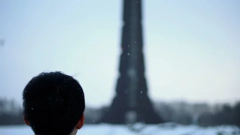 Man Walking Towards Mysterious Sci Fi Looking Tower Stock Footage 100875089