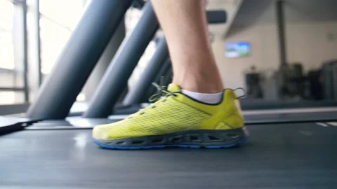 Man walking on a treadmill Stock Footage