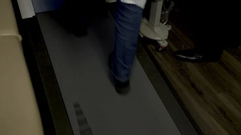 MAN WALKING ON TREADMILL FOR STRESS TEST Video stock 97228520
