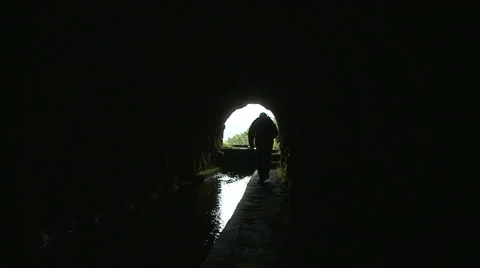 Man walking in a tunnel. Stock Footage 63373821