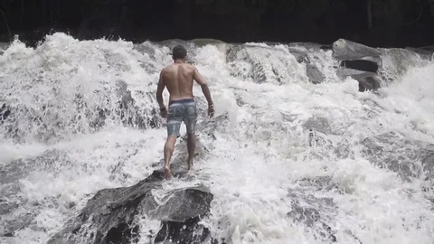 Man Walking Up Waterfall Rapids Slow Motion Stock Footage 106152230