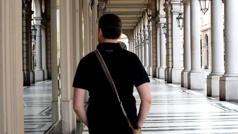 Man walking window shopping Stock Footage 76216967