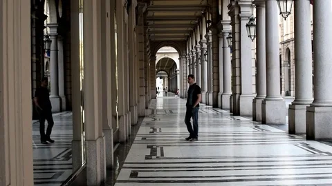 Man walking window shopping Stock Footage 76216976