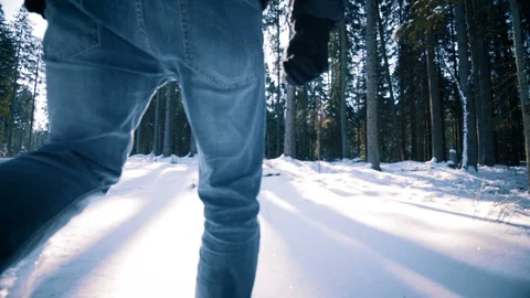Man Walking Into Winter Forest Stock Footage 87086795