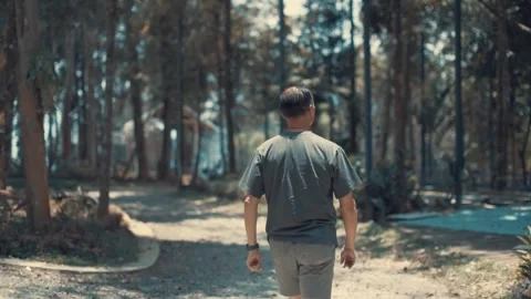Man walking into the woods alone. Stock Footage 271515150