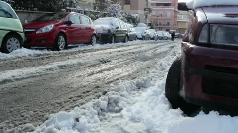 Man walkking down the snowy road Stock-Footage 10770181