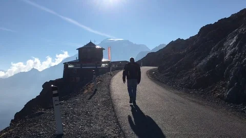 Man walks along a path Stock Footage 113482076