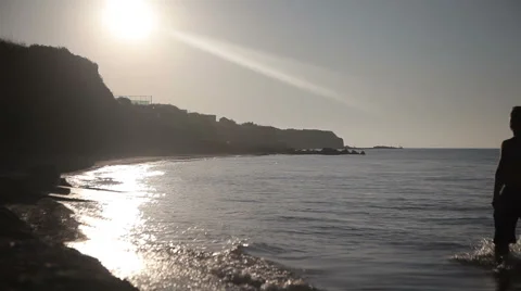 A man walks along the seashore Video stock 66716481