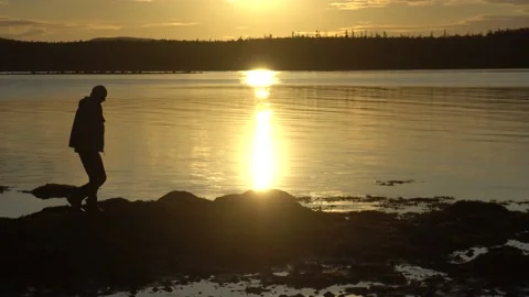 A man walks along the seashore Video stock 152373880