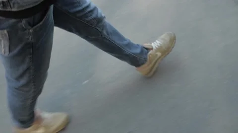 A man walks along the sidewalk. Stock Footage 51756112