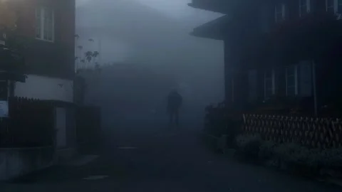 A man walks with backpack in a thick fog. Stock Footage 201165047