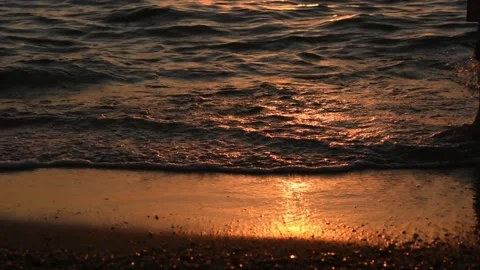 A man walks on the beach with the sea in the background Video stock 145662579