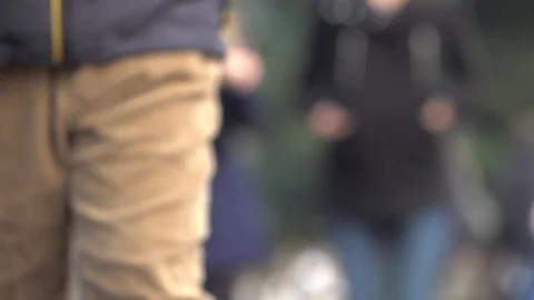 Man walks from blurry crowd Stock-Footage 102777931