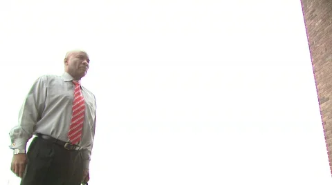 Man walks into a building Stock Footage 479702