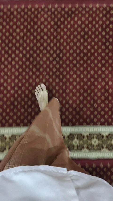 A Man Walks on A Carpet in A Mosque Stock Footage 314492748