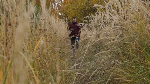 A Man walks with dog Stock Footage 81183268
