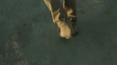 Man walks down close-up of feet Stock Footage 59955397