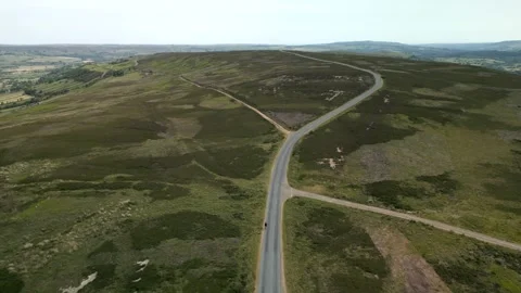 A man walks down a long road into the distance Stock Footage 253554847