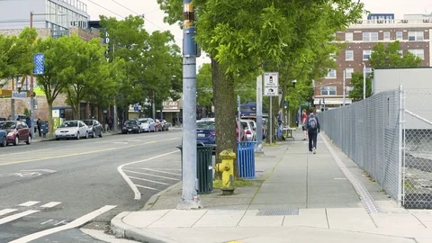 Man walks down quite sidewalk in downtown Seattle Stock Footage 73493240