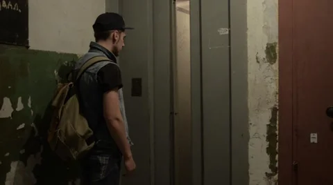 A man walks into the elevator. Stock Footage 51756124