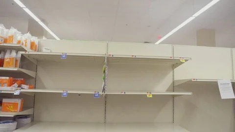 Man Walks By Empty Paper Towel Shelf During Coronavirus Pandemic Stock-Footage 127012103