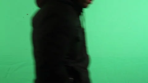 Man Walks by Green screen Stock Footage 51344569