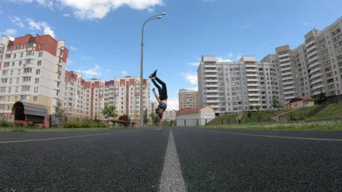 The man walks on his hands Stock Footage 196498157