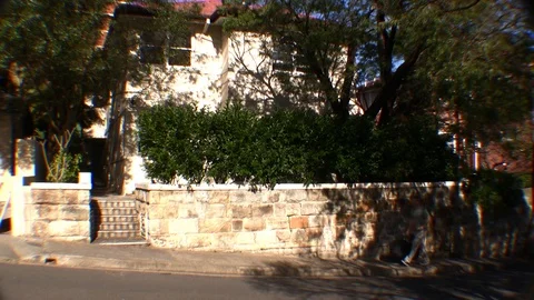 Man walks to house Stock Footage 99604135