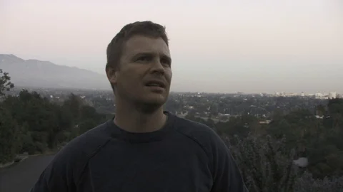 A man walks up a mountain. Stock Footage 99604857